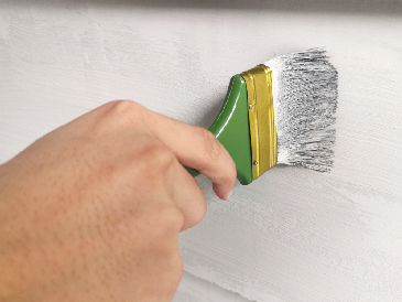 Professional cabinet finishing with smooth brush-applied paint